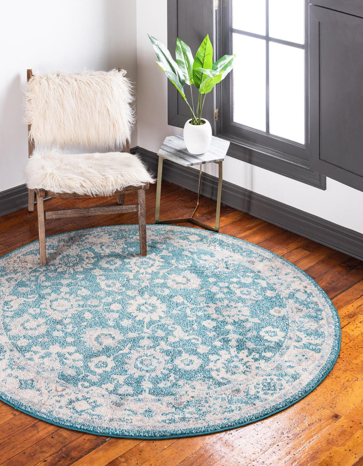 Penrose Krystle Turquoise & Beige Area Rug | Round in room