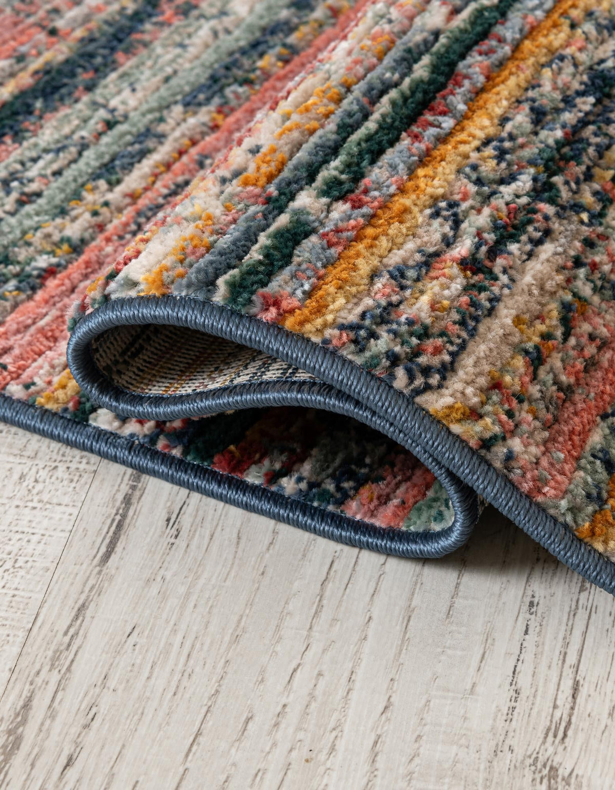 Gemstone Topaz Multi & Blue Area Rug | manufacturer source supplemental photo 3166984_detais_1_roll.jpg