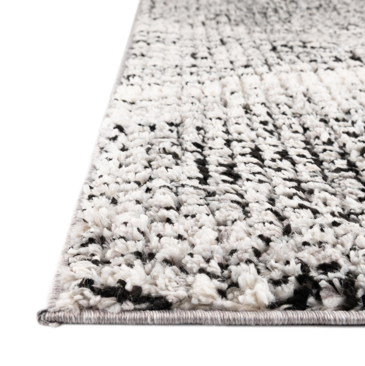 Tagine Malika Black and White Area Rug: Same design/color lifestyle; shape may differ