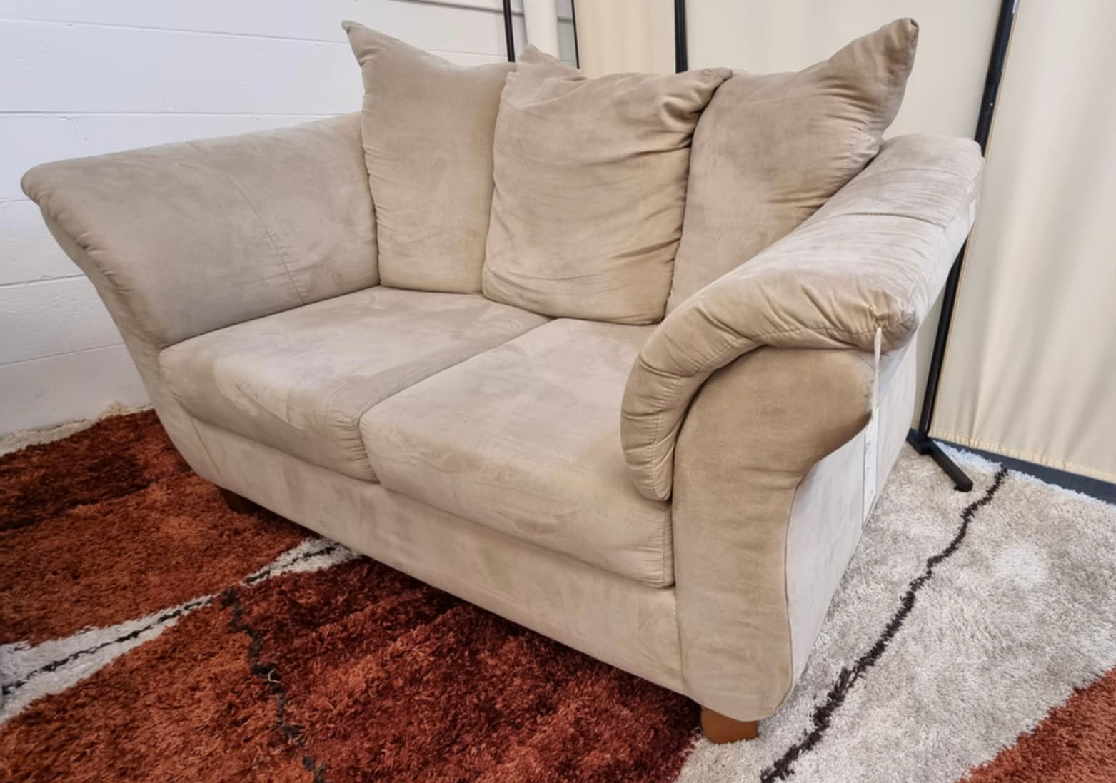 Beige Ashley Furniture Loveseat Sofa