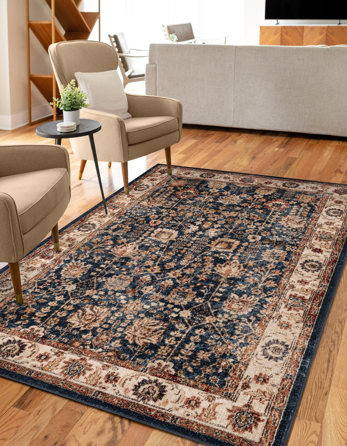 Utopia Antheia light blue and burgundy area rug in a room setting