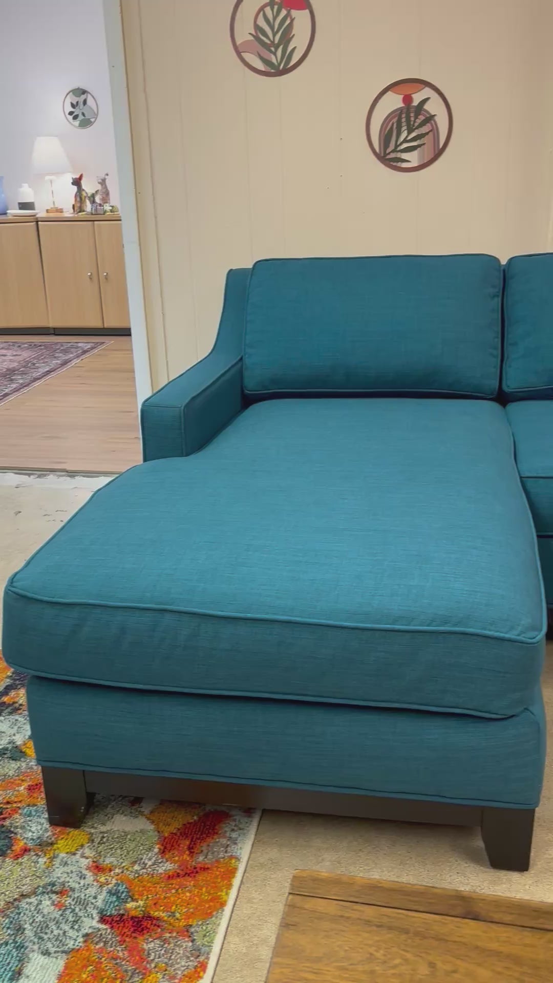 Load video: Teal Jonathan Lewis Macy's Reversible Chaise Sectional